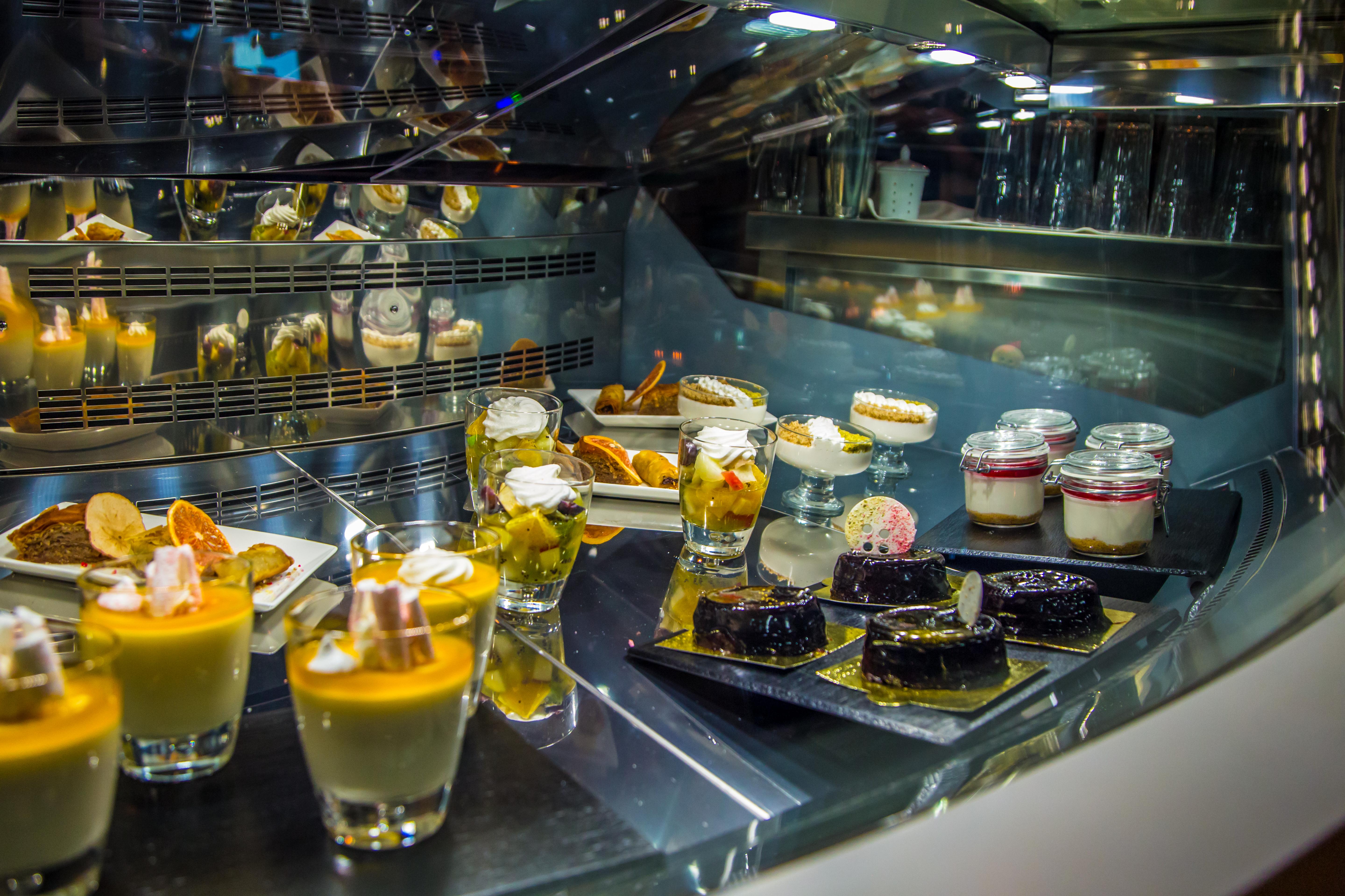 Malak Regency Hotel Ilidza Exterior photo A display of desserts